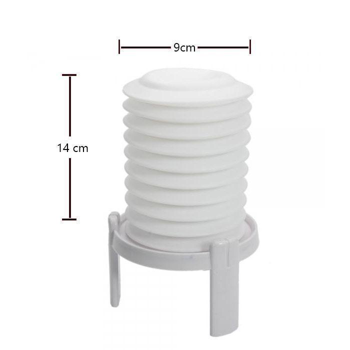 Close-up of the cooking gadget: a white plastic hard-boiled egg peeler.