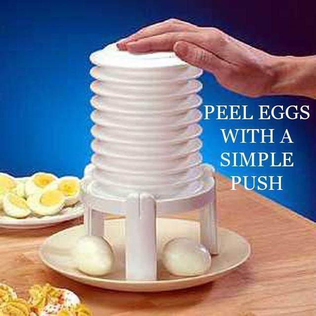 Hard-boiled egg peeler tool, white plastic, simplifying kitchen tasks. Cooking accessory.