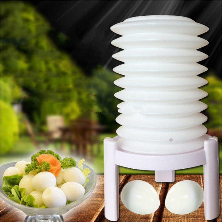 Kitchen tool: white plastic hard-boiled egg peeler for efficient cooking preparation.