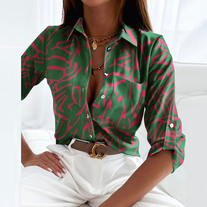 Versatile women's classic collared top, long sleeve, designed for sophisticated office and casual chic appeal.