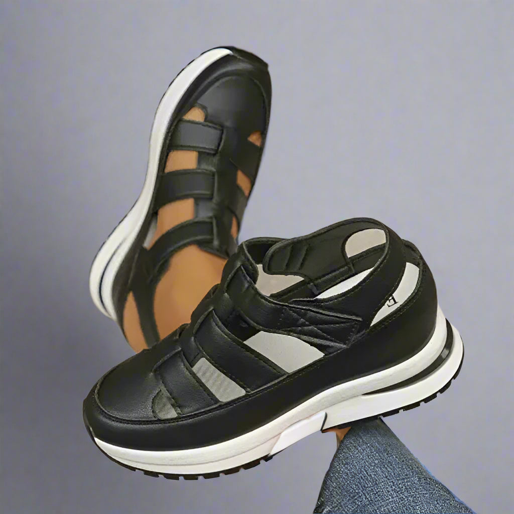 Close-up of women's spring platform sneakers showcasing unique cutout details and comfortable design.