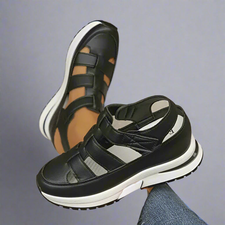 Close-up of women's spring platform sneakers showcasing unique cutout details and comfortable design.
