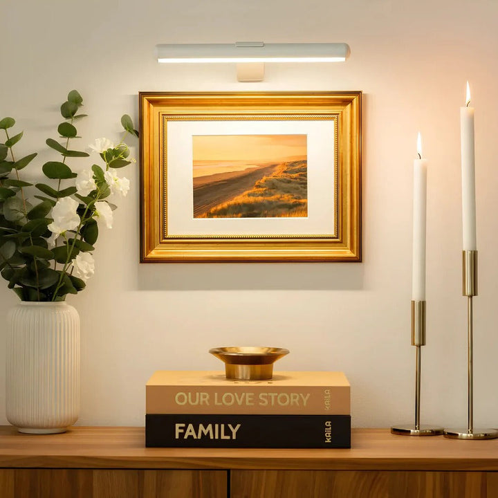 Rechargeable wireless LED picture light. Dimmable for art & wall decor. Modern USB charging artwork lighting.
