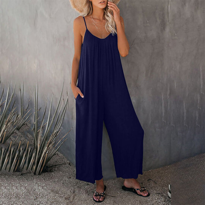 Model posing in a comfortable stretchy jumpsuit, highlighting the flattering wide-leg silhouette