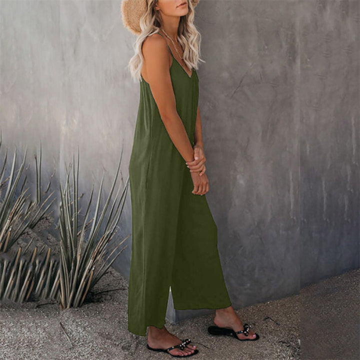 Back view of a sleeveless strap jumpsuit, showing the relaxed fit & breathable fabric for hot weather
