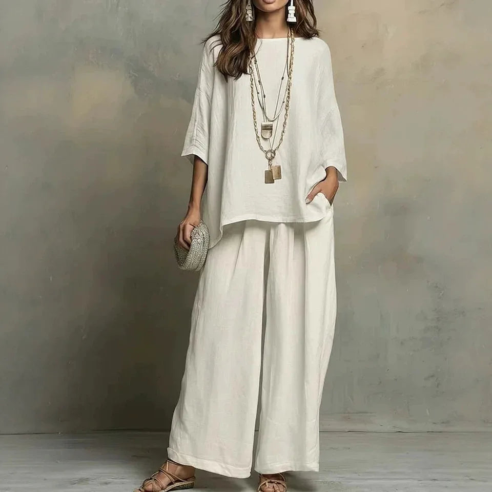 Elegant women's two-piece wide-leg pant set, perfect breathable summer apparel for comfort, travel, & effortless style.