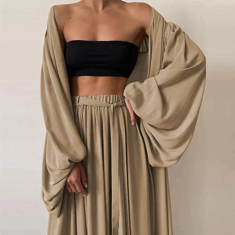 Elegant women's summer co-ord set: comfortable blazer, stylish trousers, and a coordinating top. Versatile for office/casual.