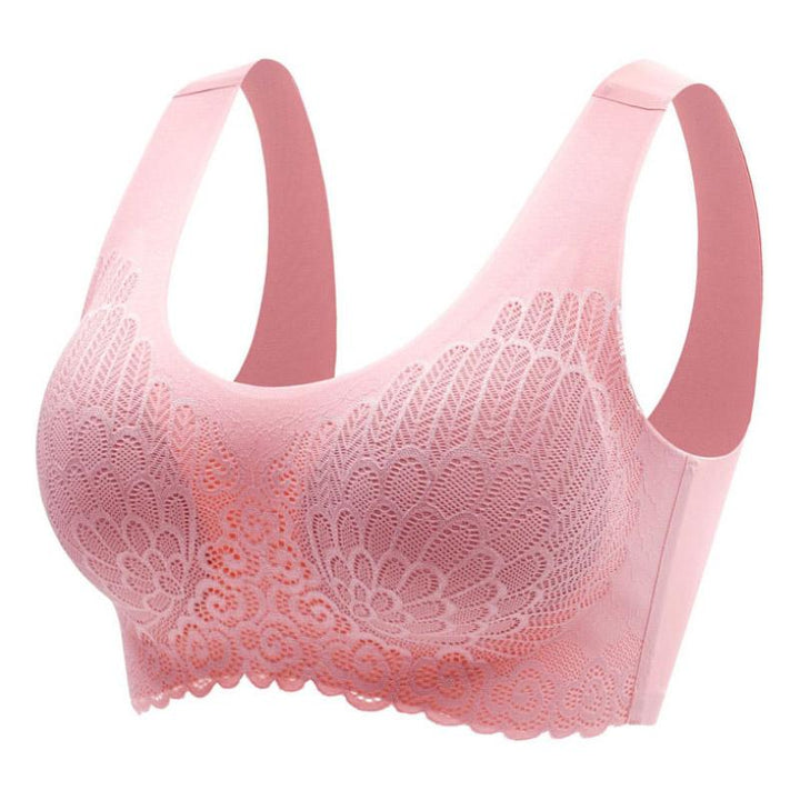 Woman smiling, confidently wearing her comfortable 5D Wireless Contour Lift Bra underneath clothing