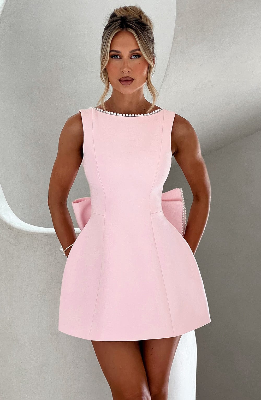 Women's A-line mini homecoming dress with elegant pearl trim, perfect for parties & special occasions.