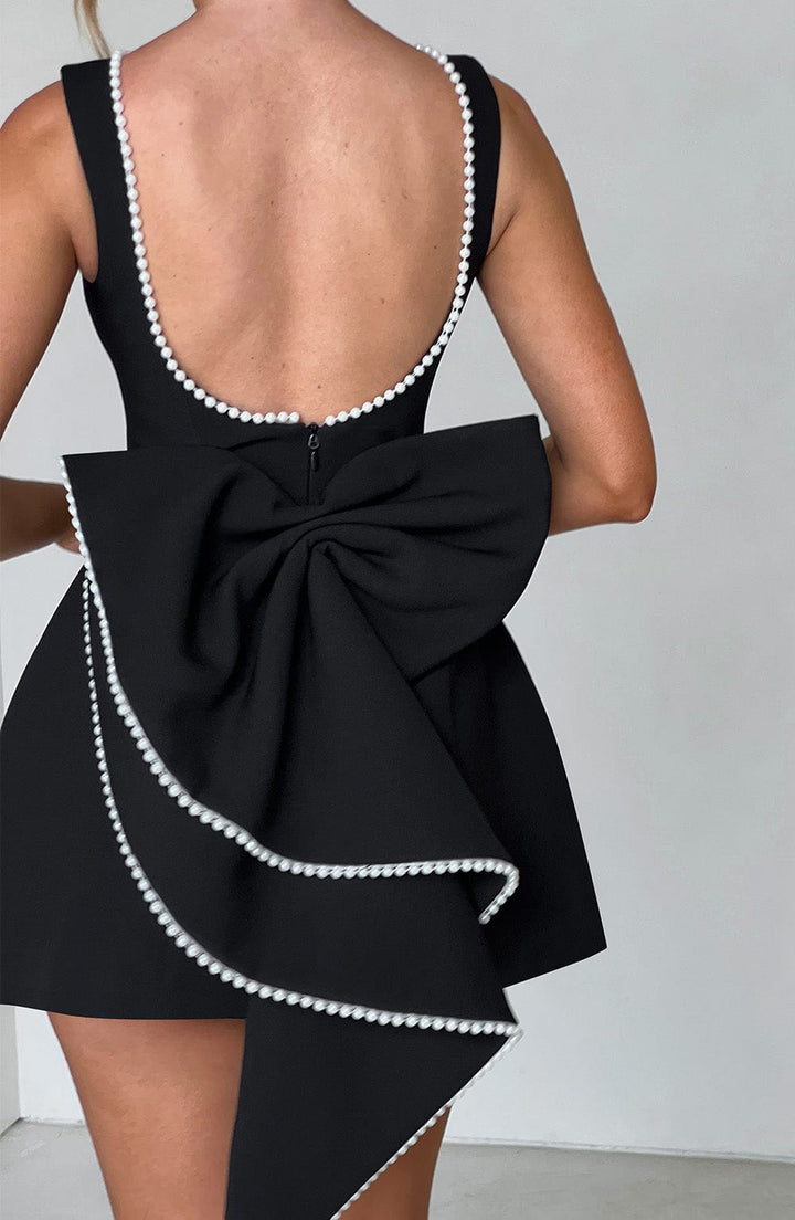 Versatile women's A-line mini dress with elegant pearl trim, suitable for homecoming, cocktail & party.