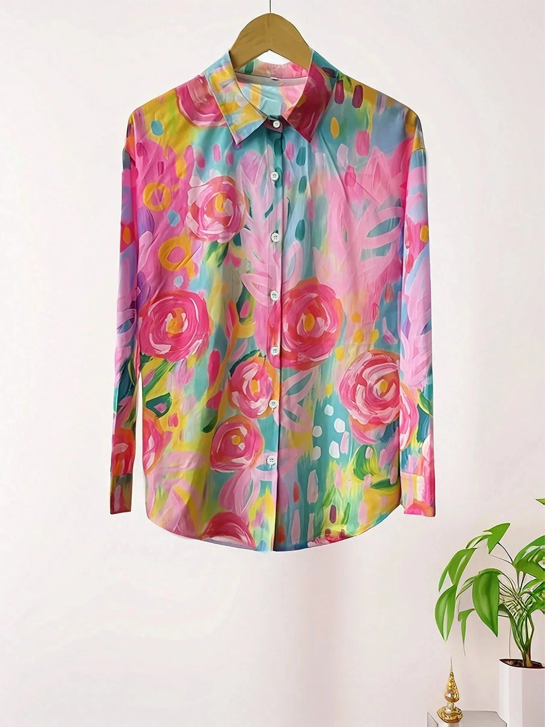 Comfortable women's work blouse with abstract print & long sleeves. A versatile button-front top for modern women.