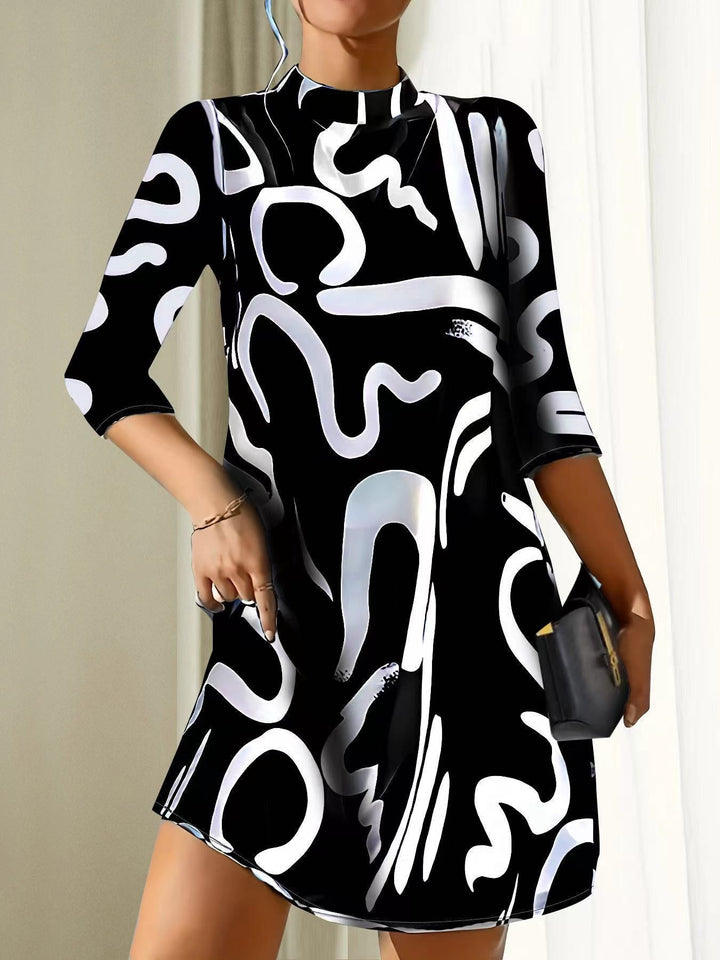 Women's abstract print mock neck dress. Stylish knee-length casual design with artistic modern patterns.