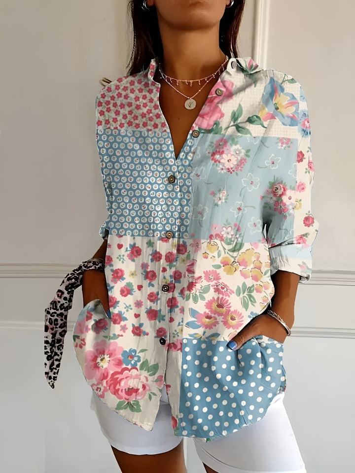 Relaxed fit women's abstract print split-neck blouse, long sleeve. Comfortable everyday or office wear.
