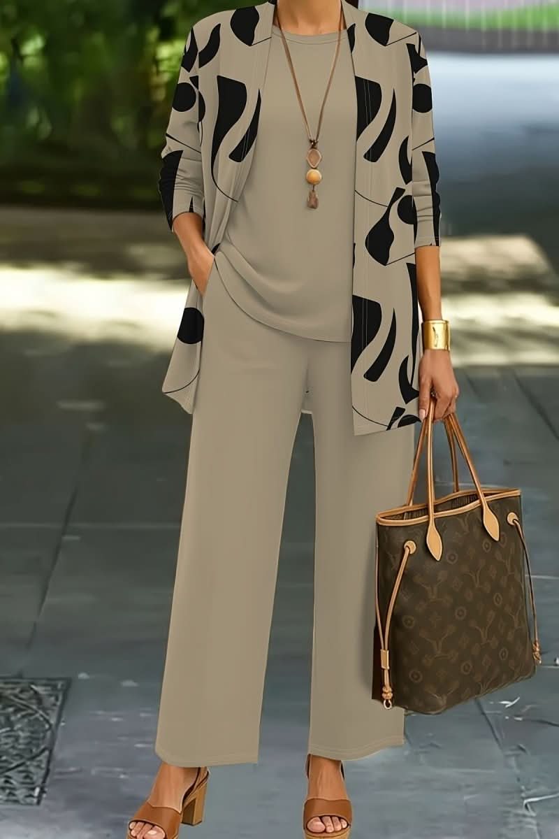 Coordinated women's abstract print loungewear three-piece set, perfect for versatile fashion and casual chic style.