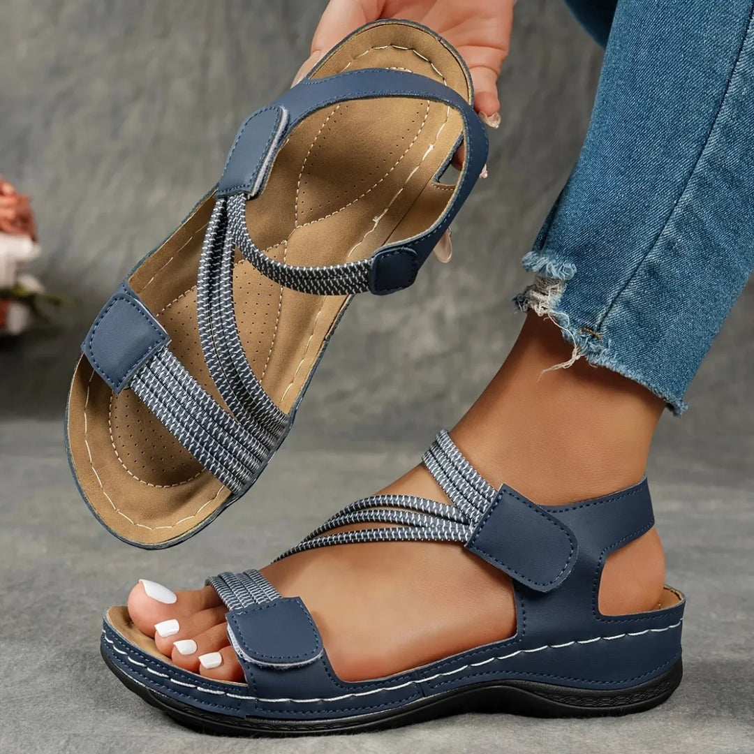 Fully adjustable women's comfort sandals with elastic and hook & loop closure for ideal fit.