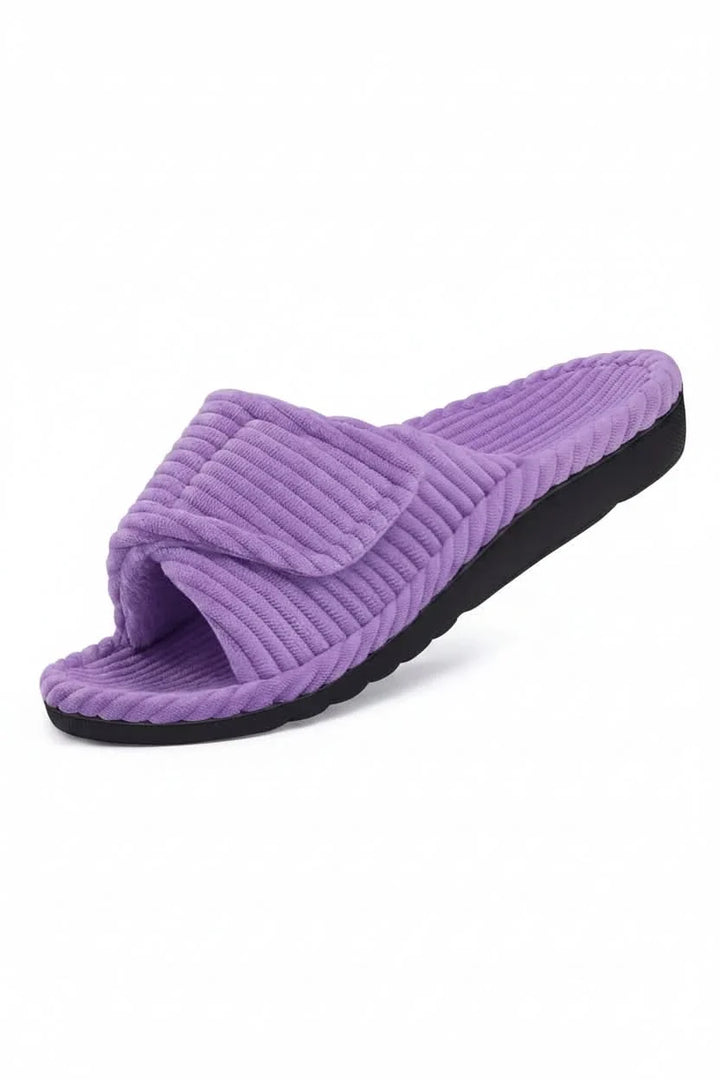 Cushioned open-toe women's slippers, providing adjustable comfort for indoor use.