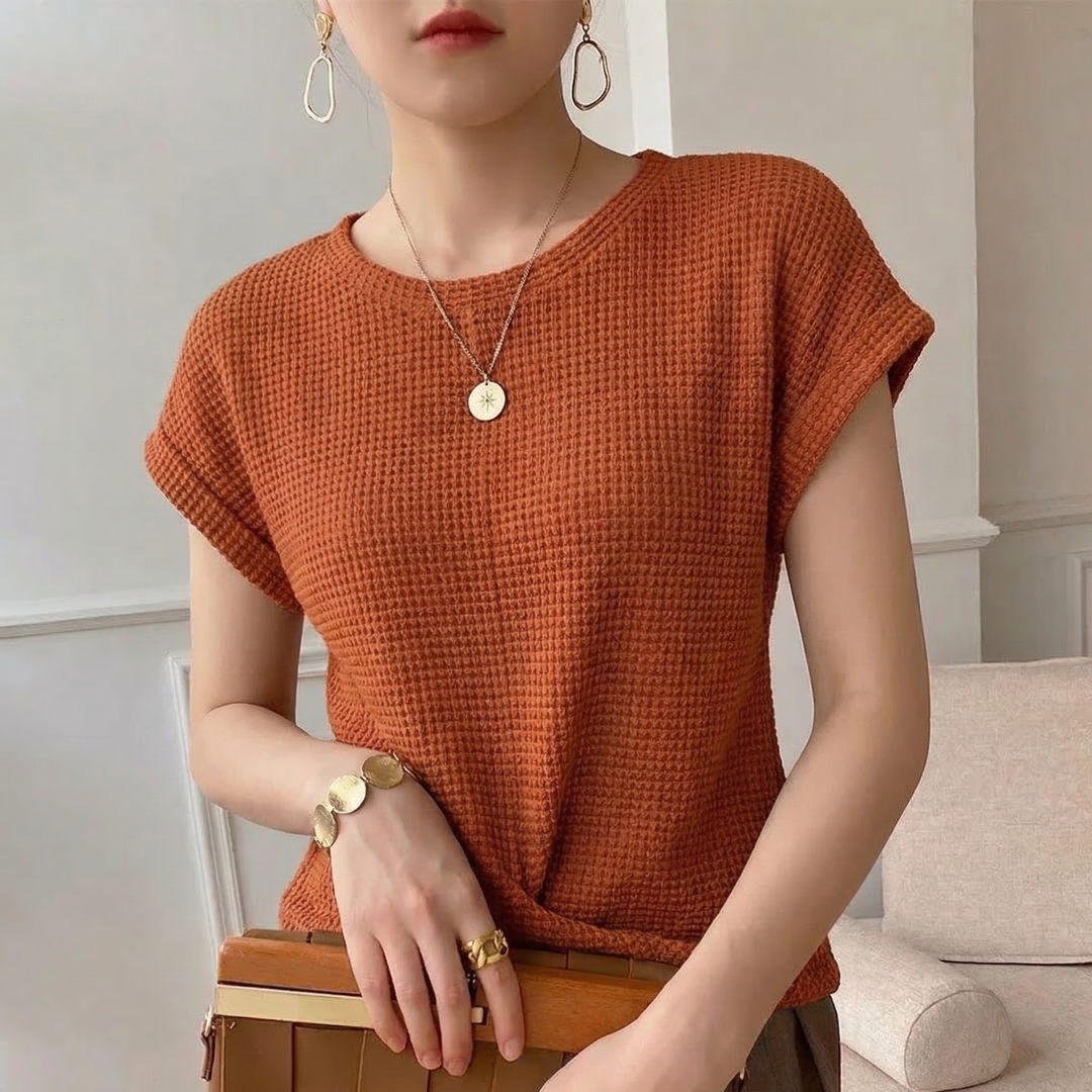 Comfortable women's amber textured top with a modern twist front, adding a chic touch to any outfit.
