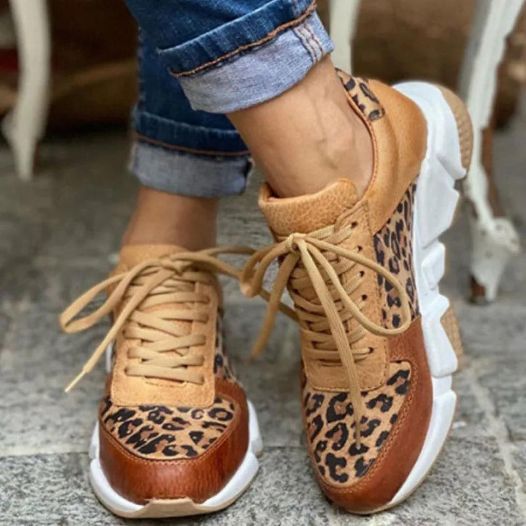 Women's animal print high-top lace-up sneakers, offering both comfort and a bold streetwear look