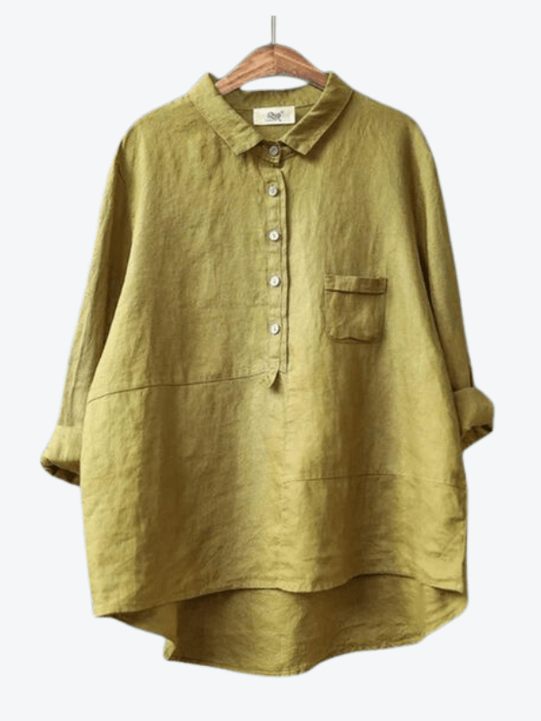 Versatile women's asymmetrical hem button-up blouse. Long-sleeve, collared, relaxed fit for stylish everyday wear.