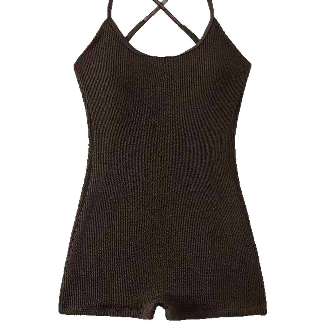 Women's athletic ribbed tank monokini swimsuit, versatile one-piece for beach, pool, and summer sports.