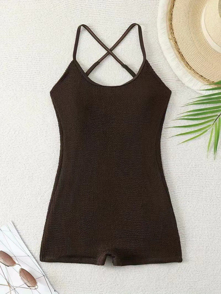 Modern women's athletic ribbed tank monokini swimsuit, a performance one-piece for aquatic sports enthusiasts.