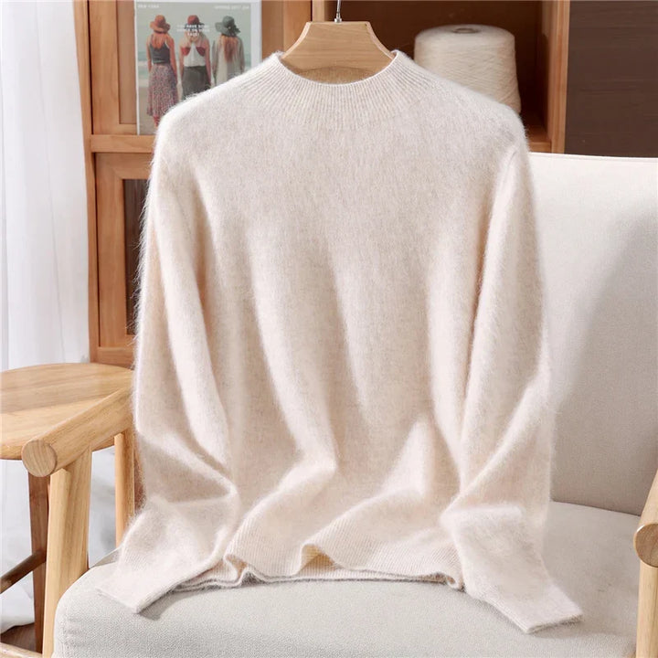 Luxurious women's ultra soft pullover sweater with a stylish mock neck. Ideal for comfortable layering in cold weather.