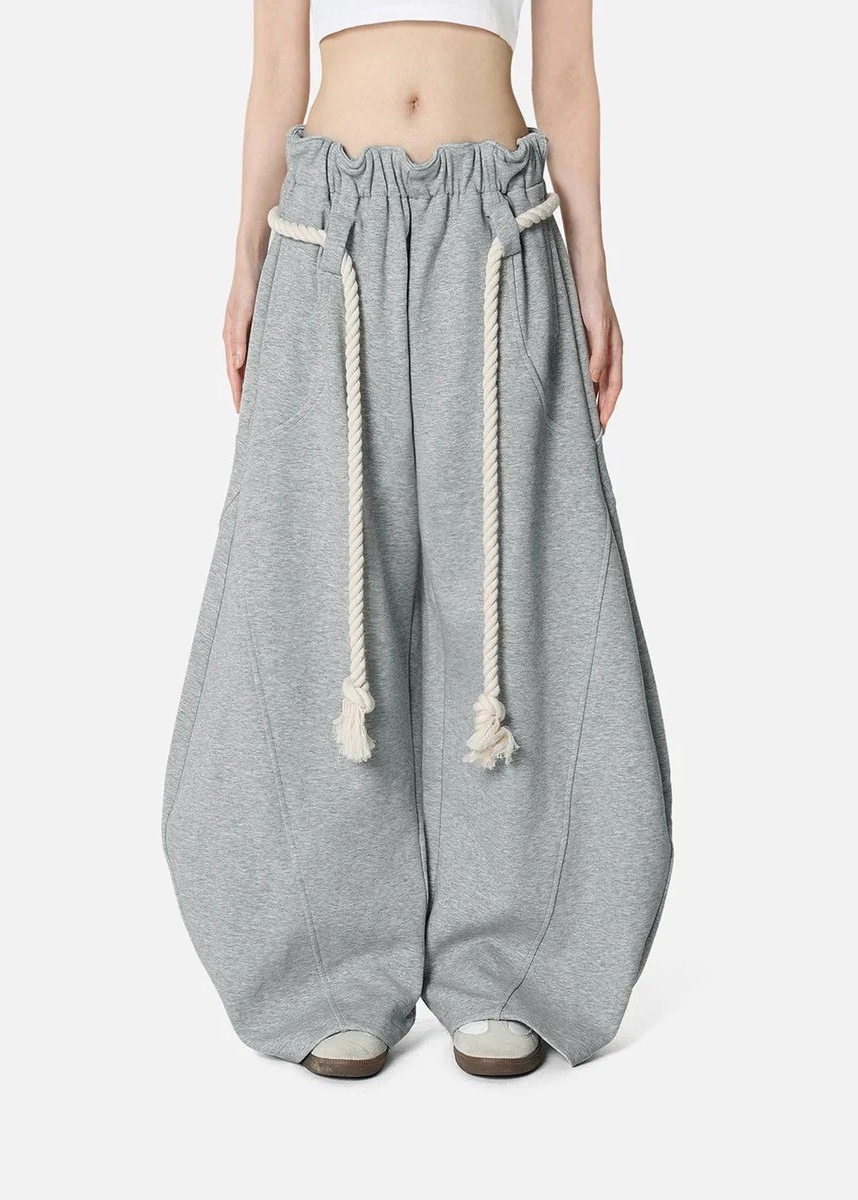 Oversized women's barrel leg sweatpants with a relaxed, baggy fit and comfortable elastic waistband.