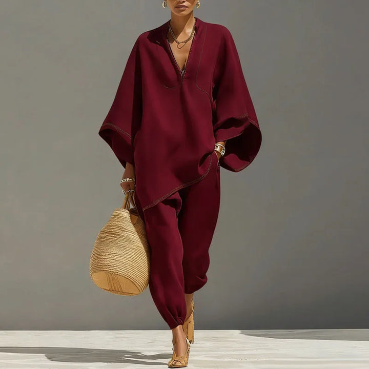 Trendy women's two-piece lounge set, boasting batwing sleeves and a relaxed fit for stylish comfort.
