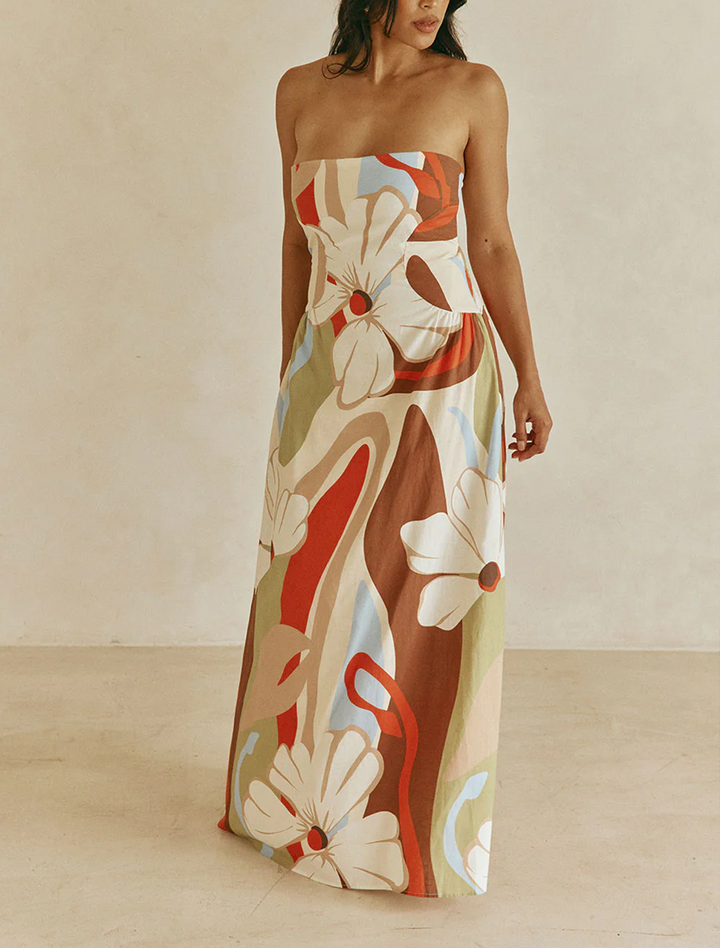 Elegant A-line beige floral strapless maxi dress for women, ideal for summer parties & resort wear.