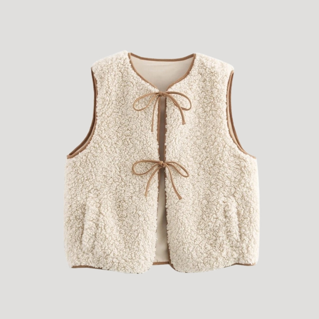 Women's beige tie-front cozy vest, perfect for spring layering and casual wear.