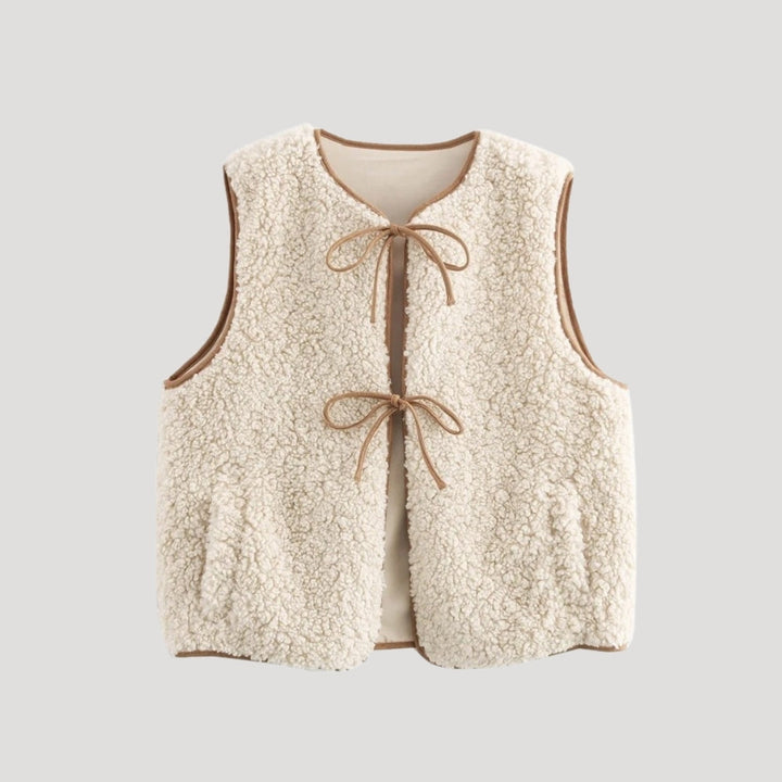 Women's beige tie-front cozy vest, perfect for spring layering and casual wear.