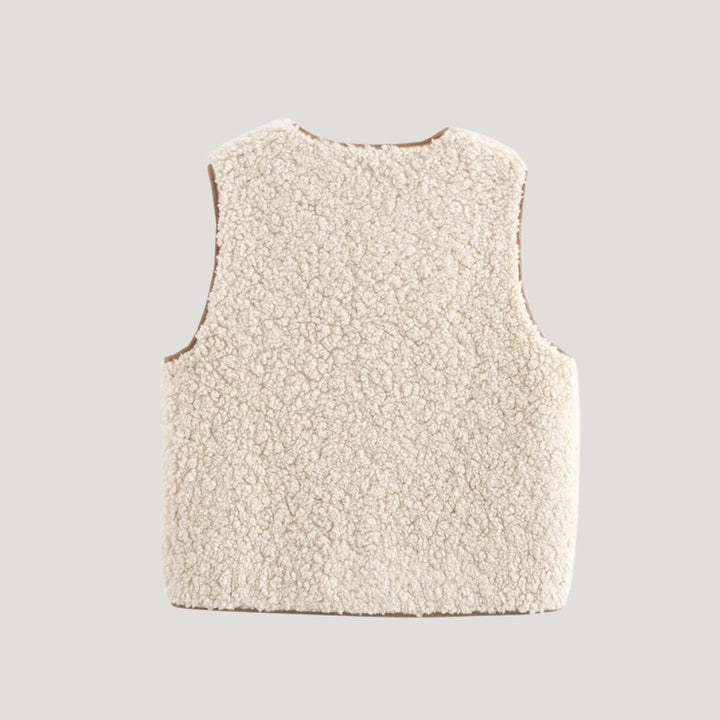 Lightweight women's sleeveless vest with tie front, a stylish outerwear piece.