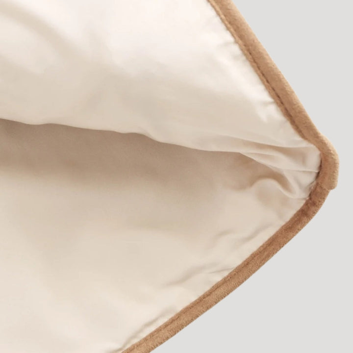 Women's neutral beige tie-front vest, a comfortable and stylish layering piece.