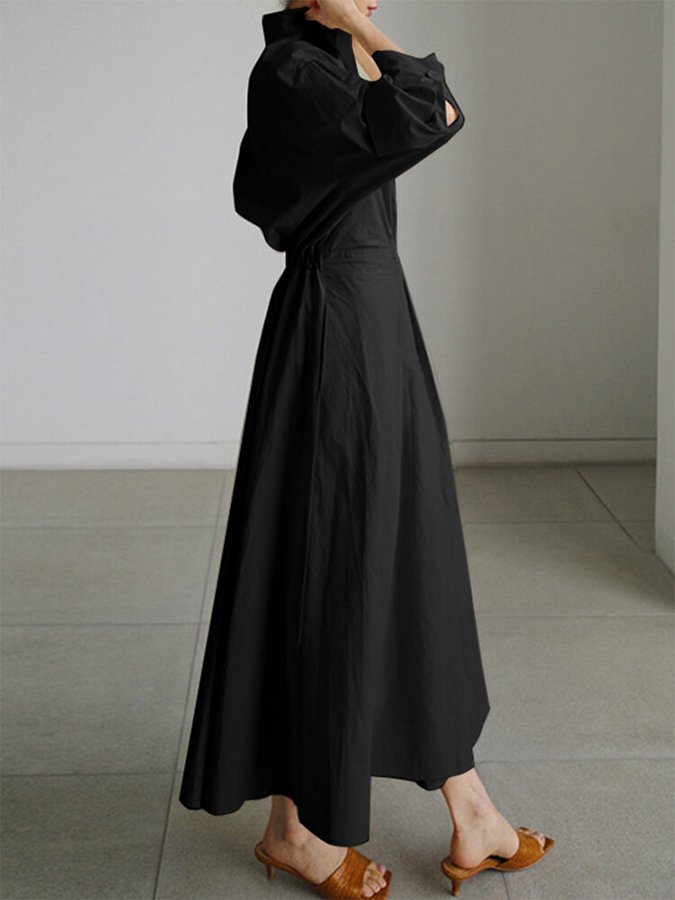 Close-up of the belted detail on a women's shirt maxi dress, ideal for everyday style