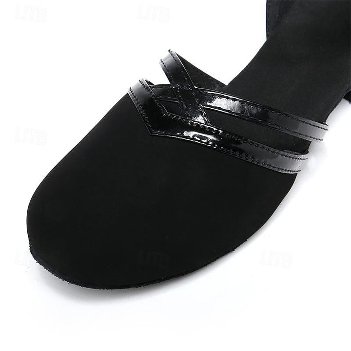 Close-up of women's black ankle strap dance shoe, showcasing the adjustable strap for a secure and comfortable fit.