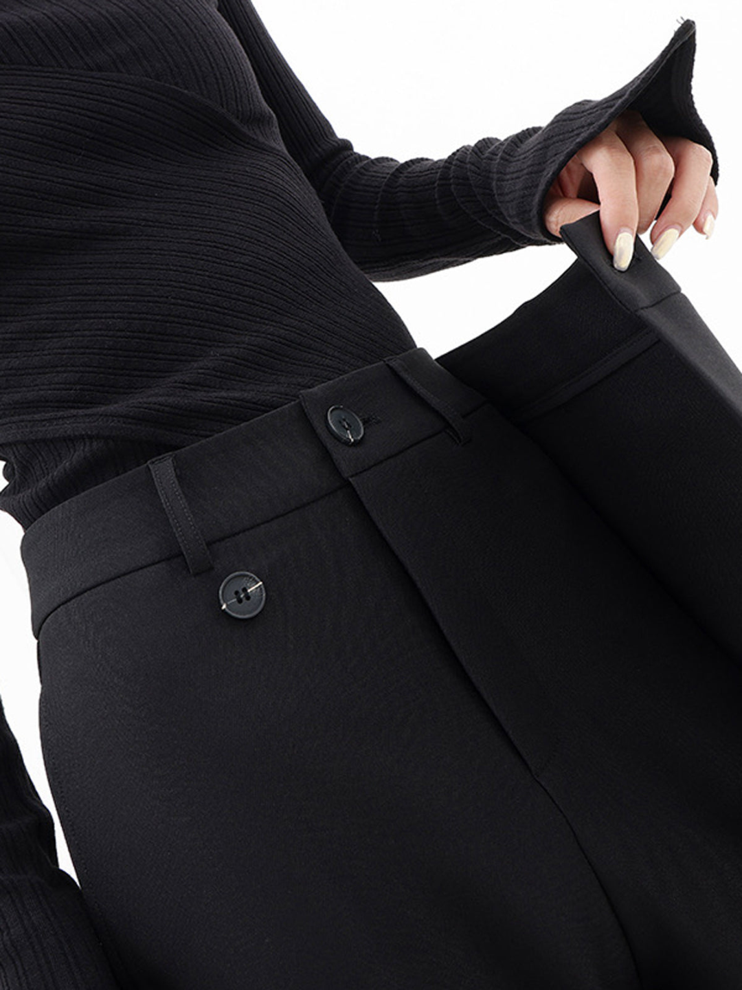 Unique asymmetric baggy trousers for women, comfortable relaxed fit in black.