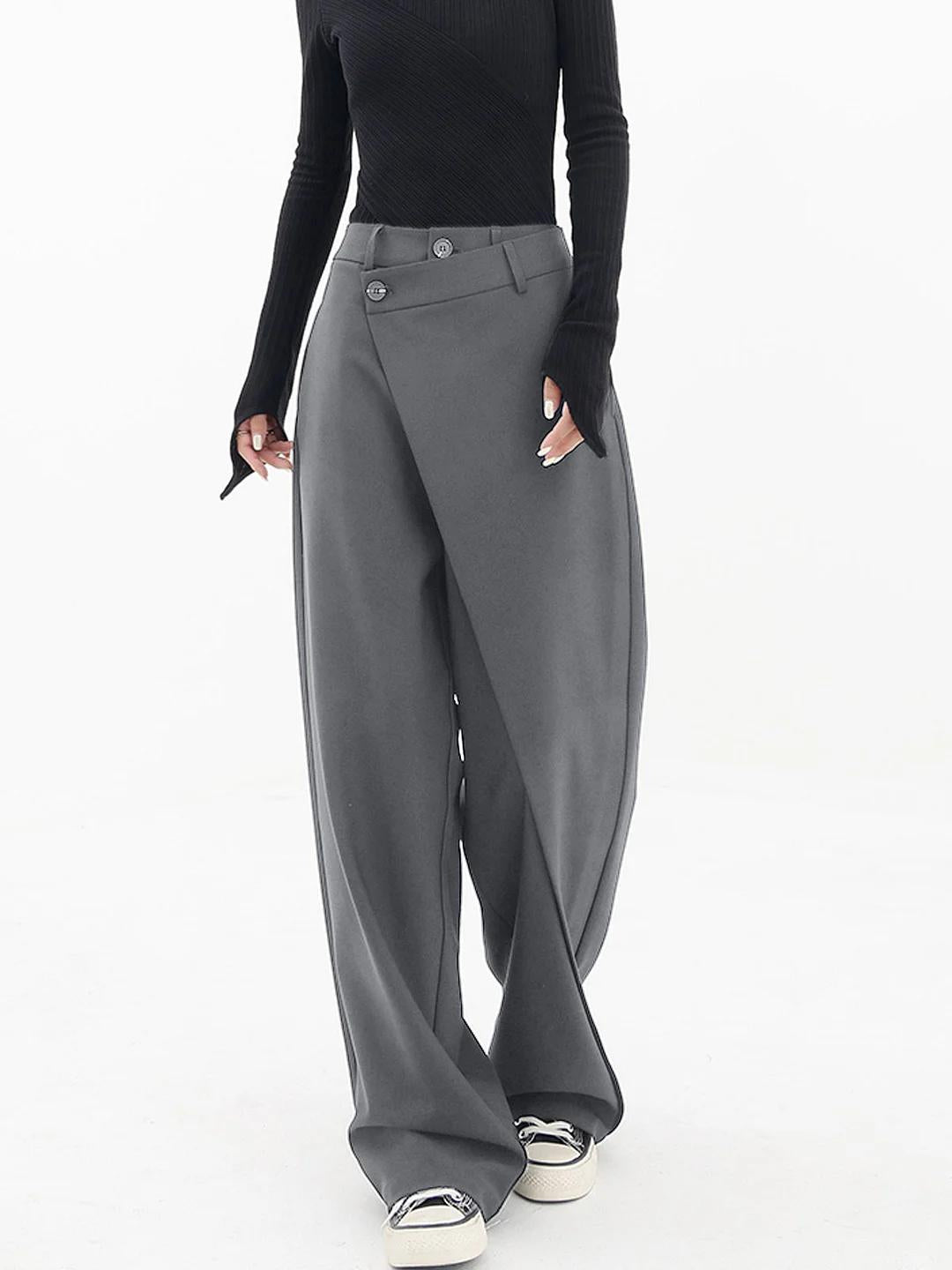 Women's baggy trousers, featuring an asymmetric design and relaxed fit for versatile styling.