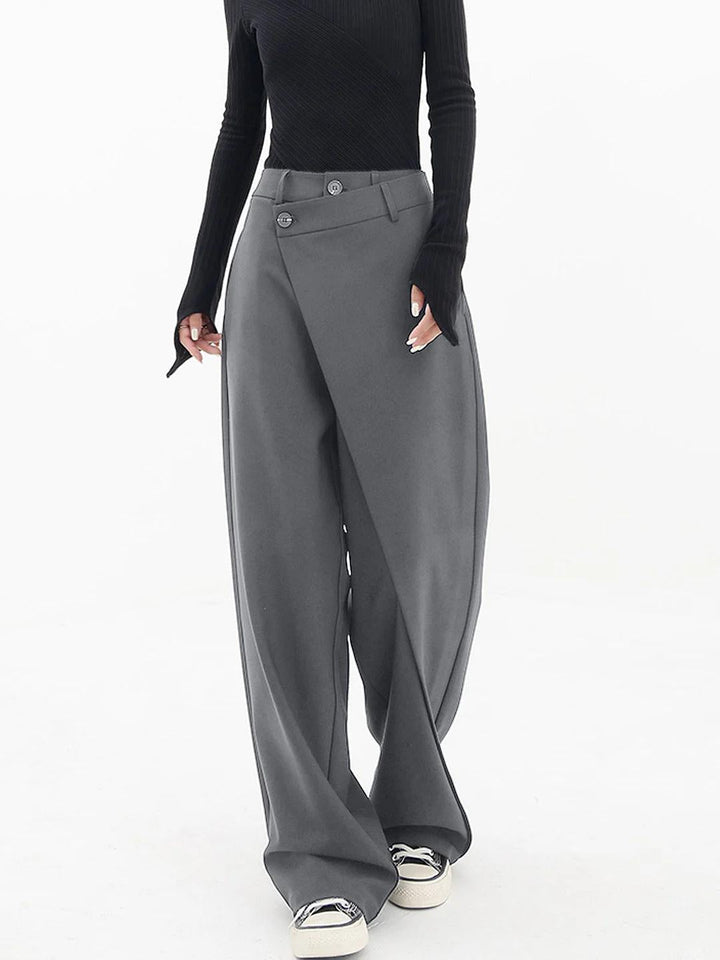 Women's baggy trousers, featuring an asymmetric design and relaxed fit for versatile styling.