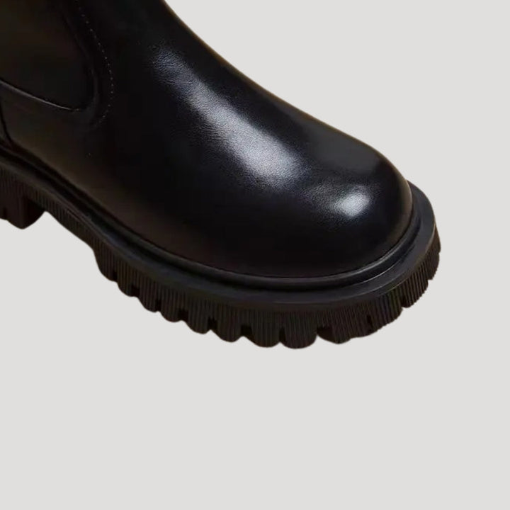 Everyday women's chunky mid-calf boots in black, suitable for spring and casual styling.