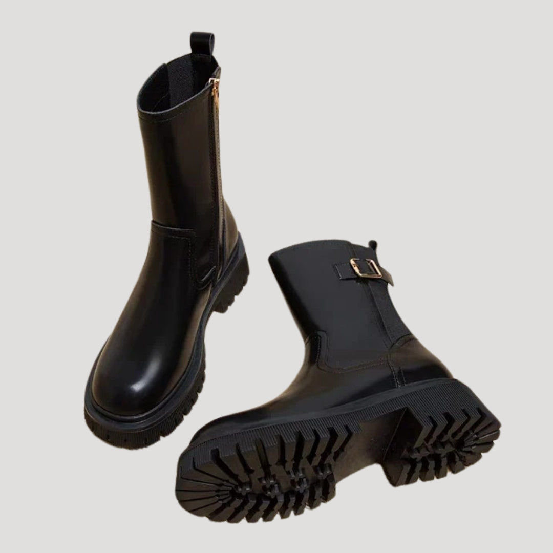 Stylish women's black chunky mid-calf boots, a must-have for spring footwear collections.