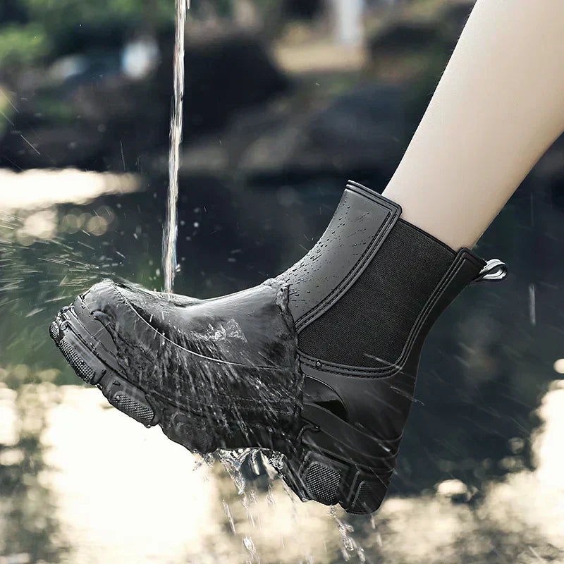 Waterproof women's Chelsea rain boots. Black chunky platform design provides style & comfort for fall and wet weather.
