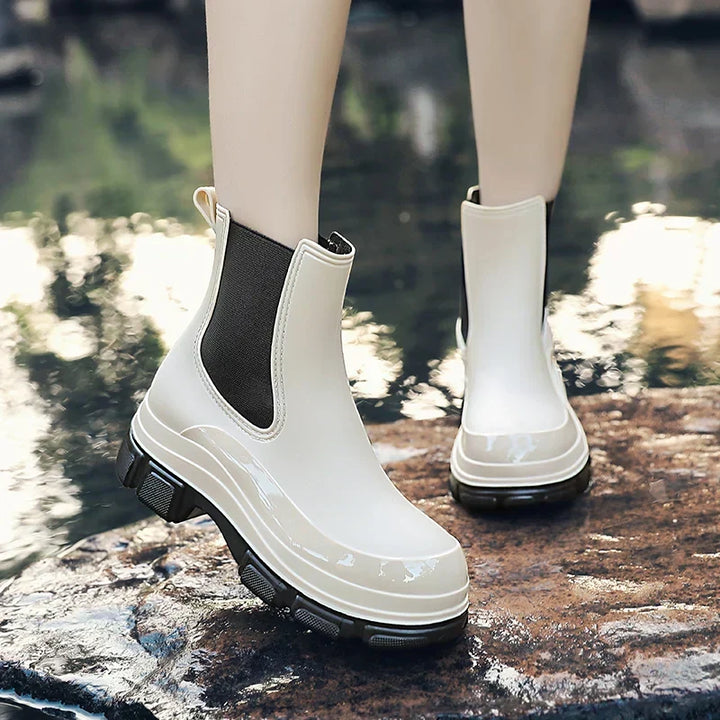 Fall fashion: women's waterproof Chelsea ankle boots featuring a trendy chunky platform sole for rain and style.