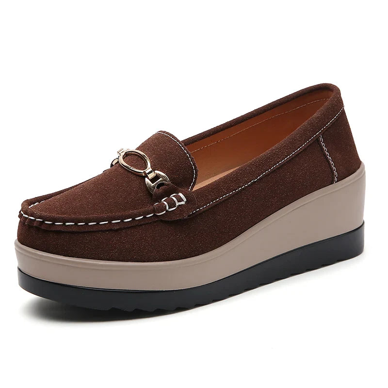 Full shot of women's black comfort platform loafers from the front, ready for wear