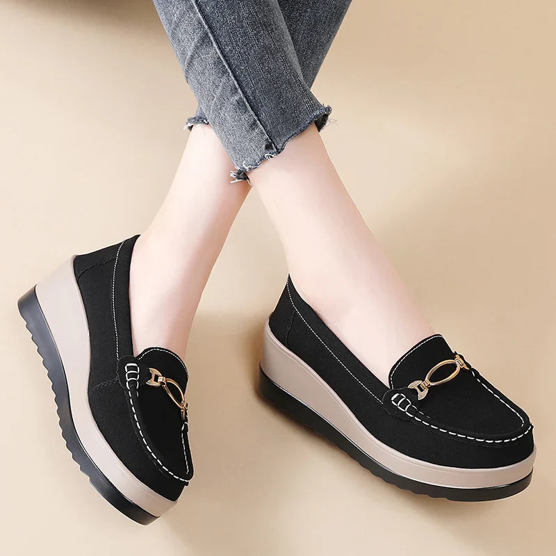 Overhead view of women's comfort platform loafers in black and brown, versatile casual shoes