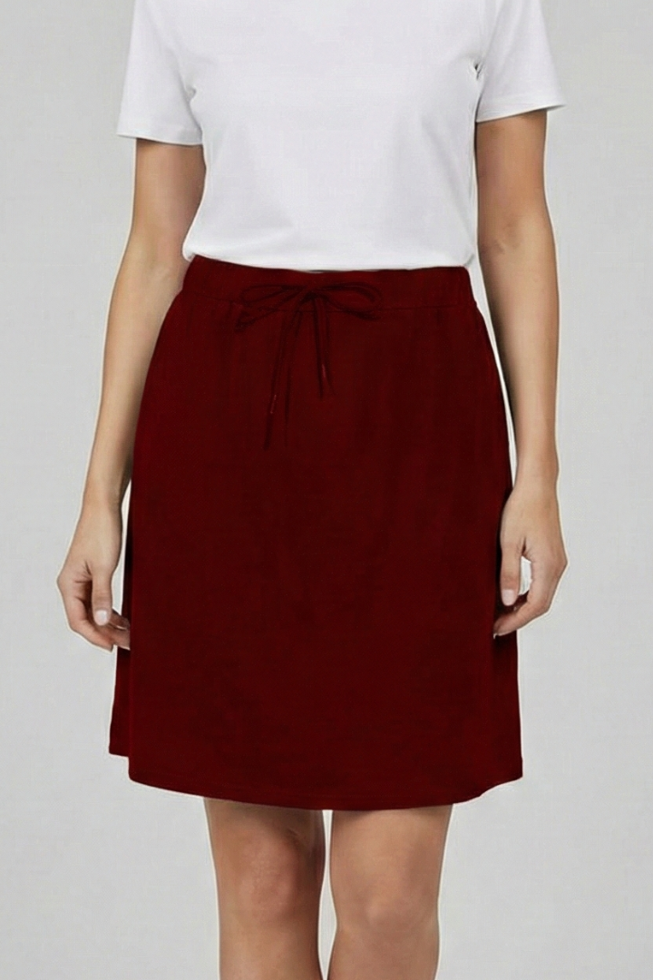 Everyday women's mid-rise skirt. Drawstring waist, built-in shorts for comfort & versatile styling.