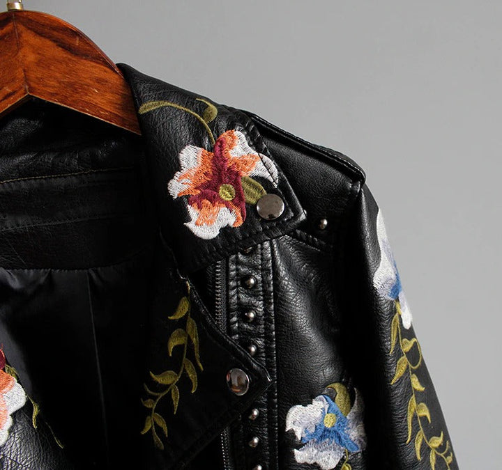 Versatile "Eleonora" women's embroidered biker jacket, blending edgy style with chic floral elegance.