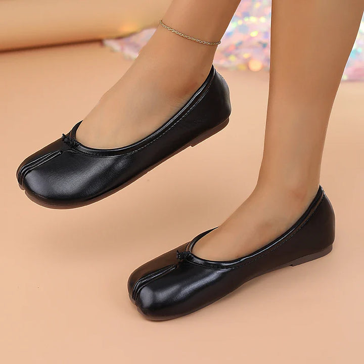 Unique tabi style women's flats, offering a fashion-forward minimalist look.
