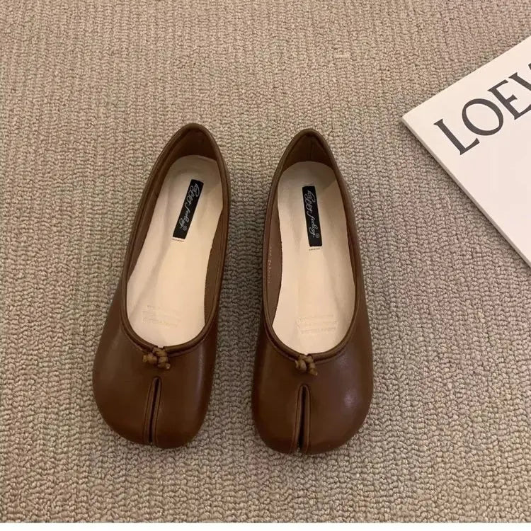 Modern women's tabi flats, offering a chic and easy-to-wear slip-on design.