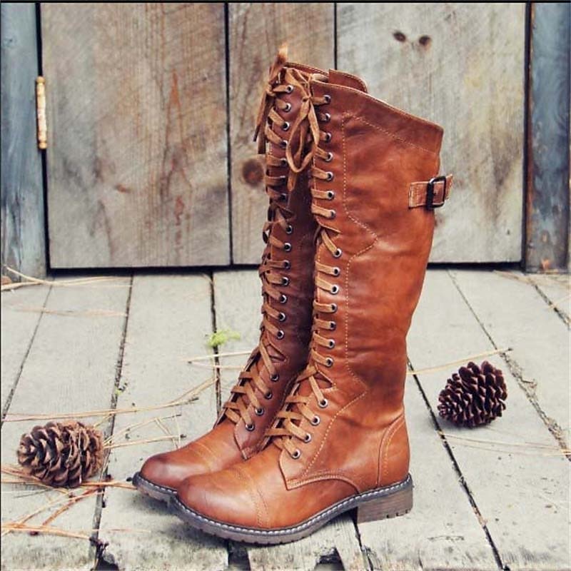 Women's black lace-up knee-high riding boots. Perfect for everyday casual fall and winter fashion.
