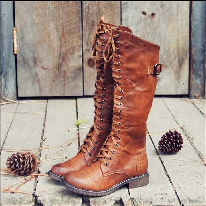 Women's black lace-up knee-high riding boots. Perfect for everyday casual fall and winter fashion.